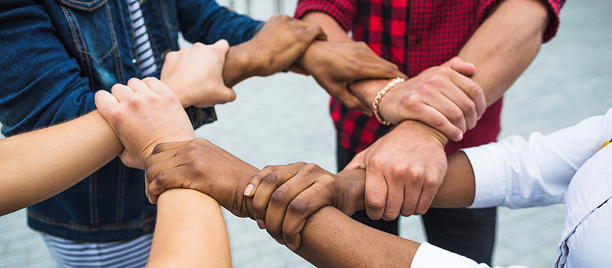 A diverse group of community members working together